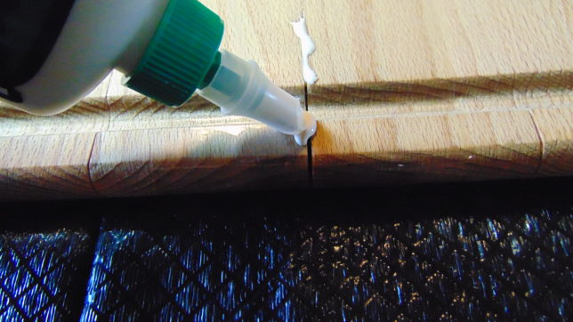 Applying glue to cracked cutting board
