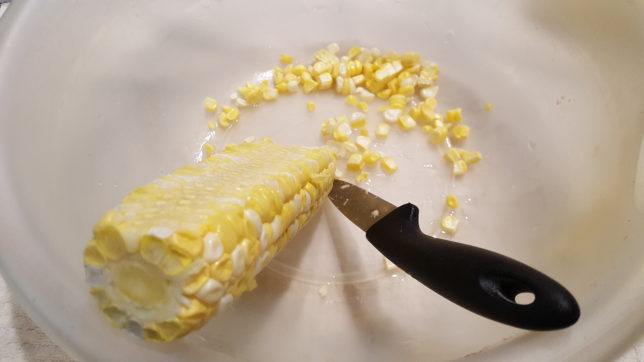 Ear of corn and knife