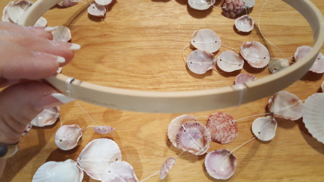 Hoop with attached seashells