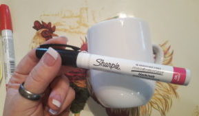 Black sharpie and white mug