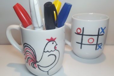Sharpe mug of rooster and tic tac toe game