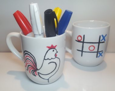 Sharpe mug of rooster and tic tac toe game