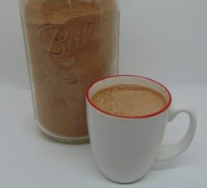 Jar and mug of hot chocolate